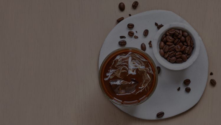 coffee with beans next to it